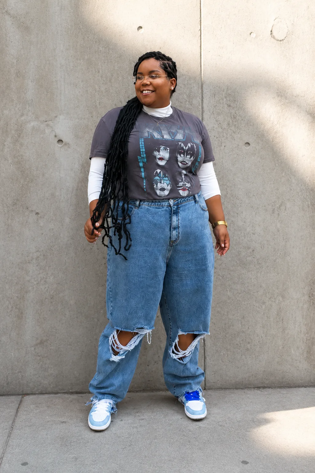 Casual cool graphic tee and ripped denim vibe