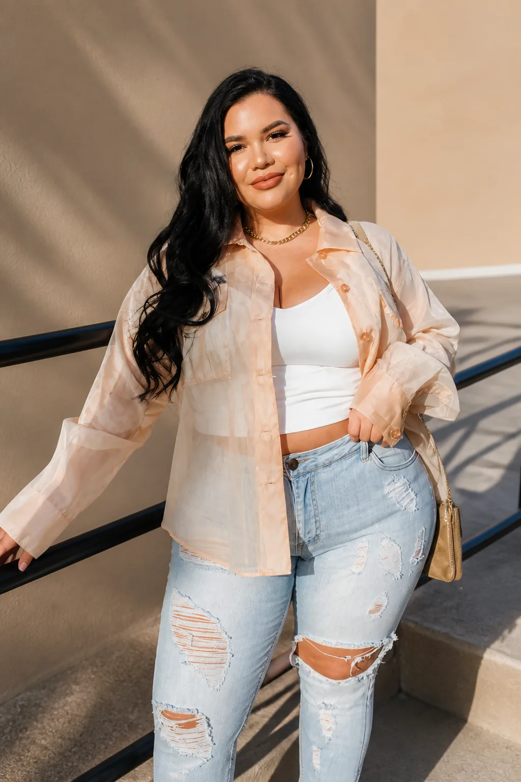 Chic Layers with Ripped Jeans