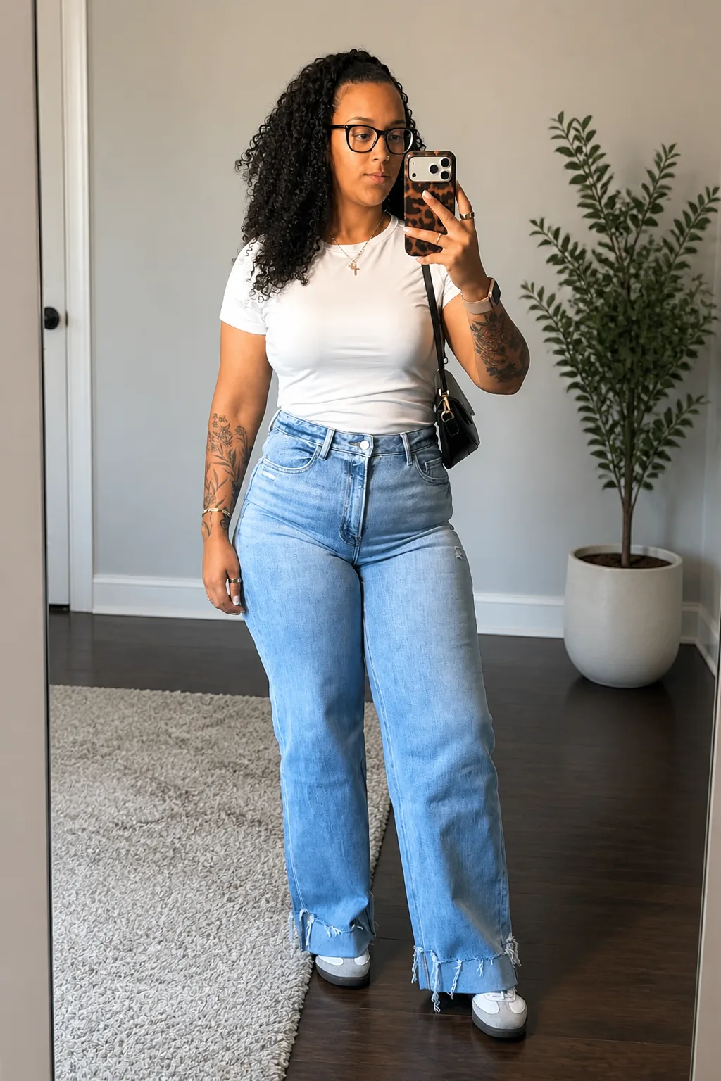 Classic white tee and light wash wide leg jeans
