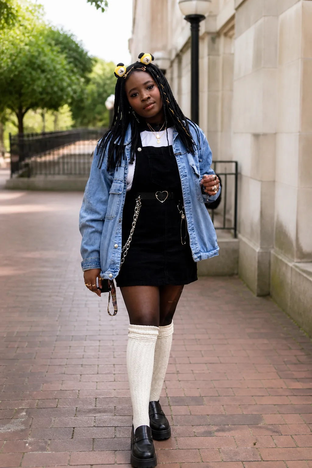 Denim-layered overall dress concert style