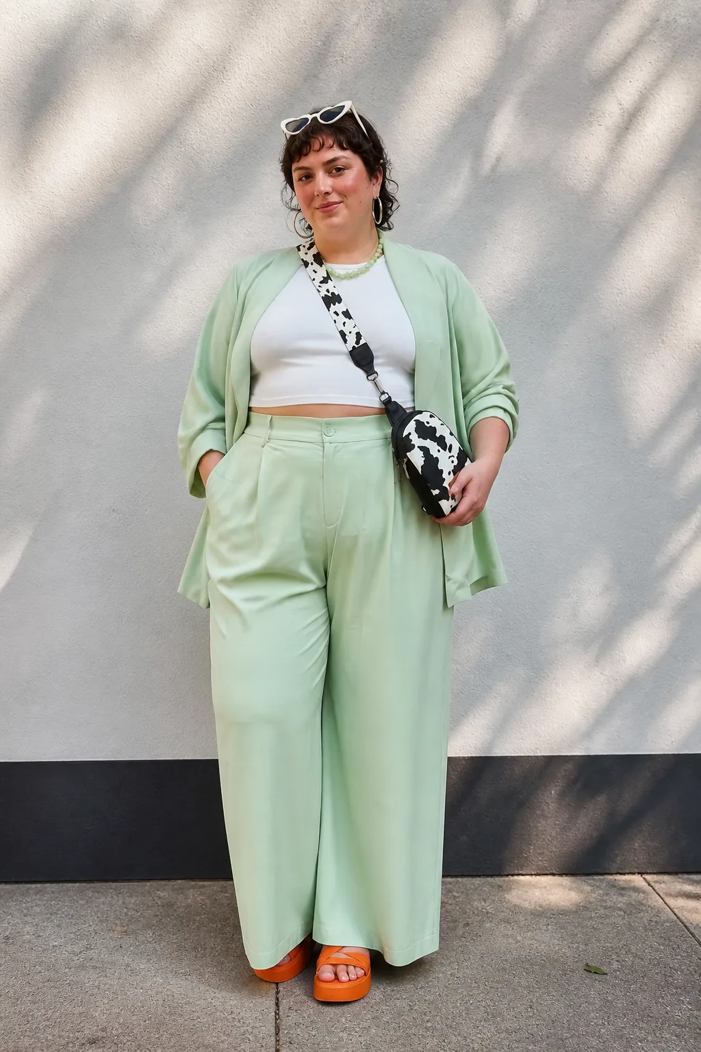 Trendy mint-green suit and cropped top styling