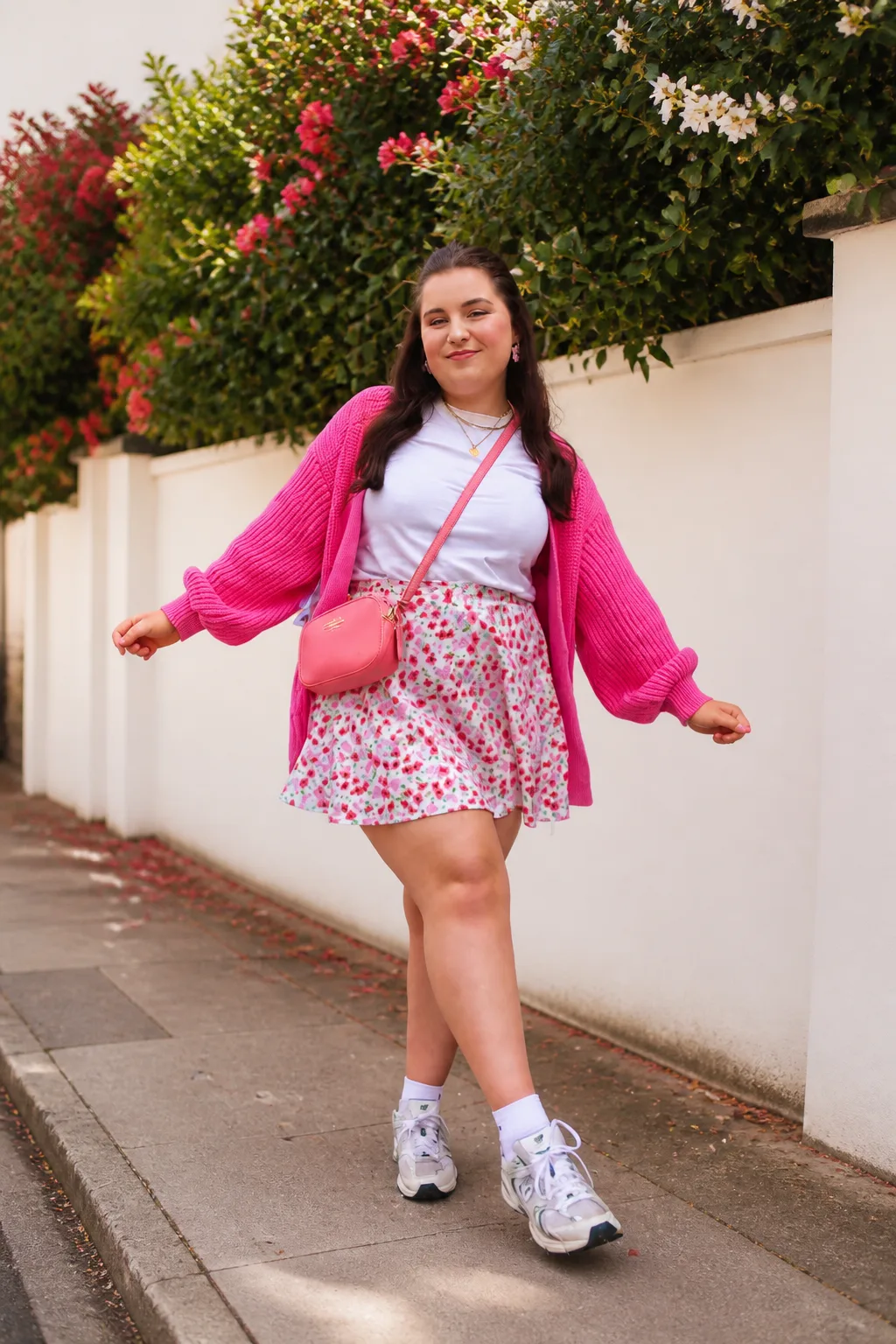 Vibrant Pink Cardigan and Floral Skirt